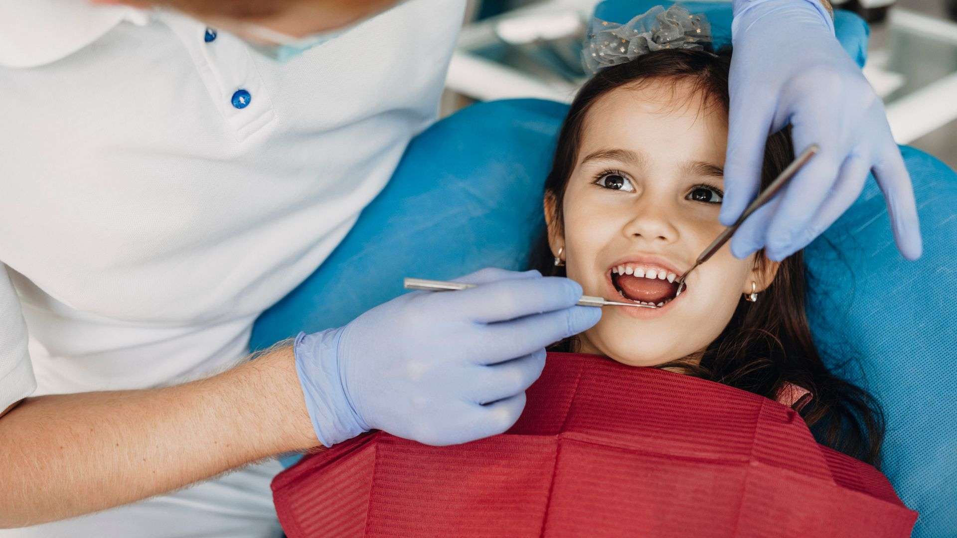 A young girl visits a pediatric dentist in Fair Oaks, CA